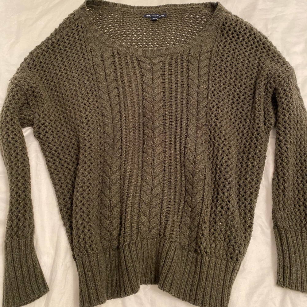 Olive green pullover sweater.